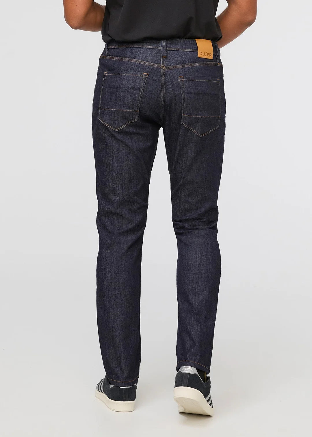 DU/ER PERF DENIM ATHLETIC TAPER JEANS